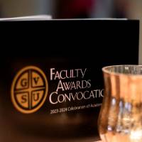 Award booklet and candle